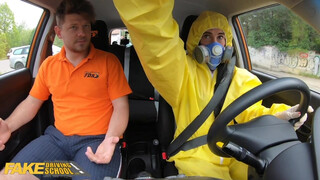 Fake Driving School - chick stapt in de auto in een hazmat pak